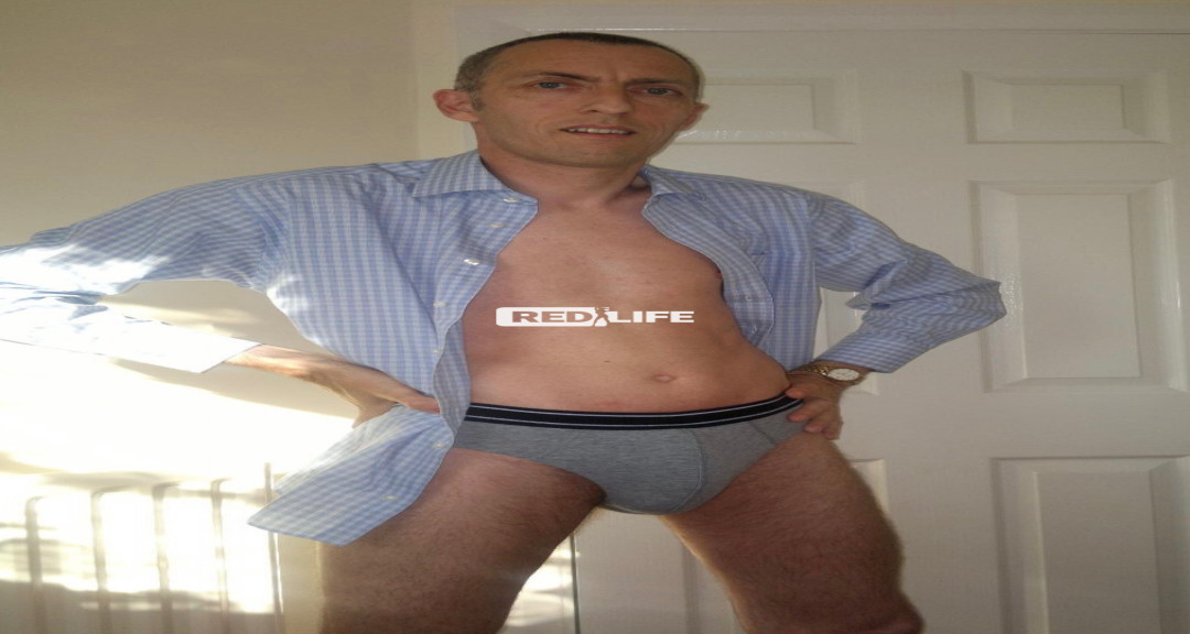 Tall slim male working as